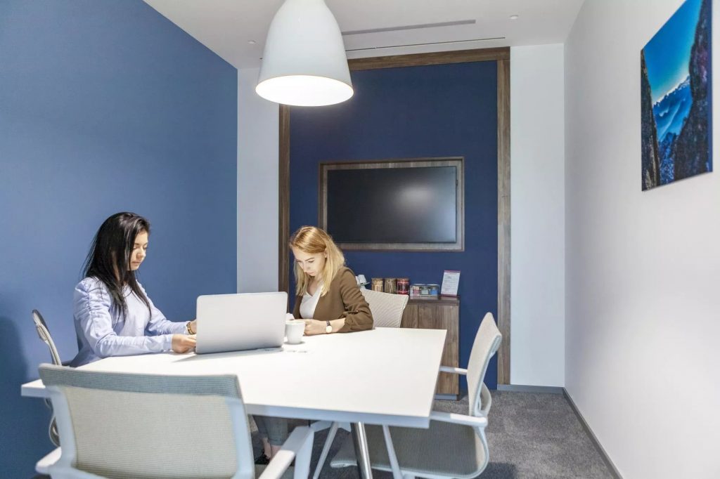 People working inside an office at Regus Villa Metro Wilanowska