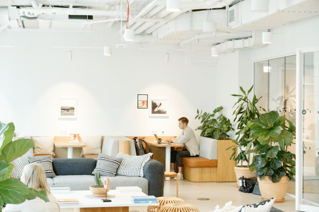 man sitting in kitchen, wework mennica legacy tower